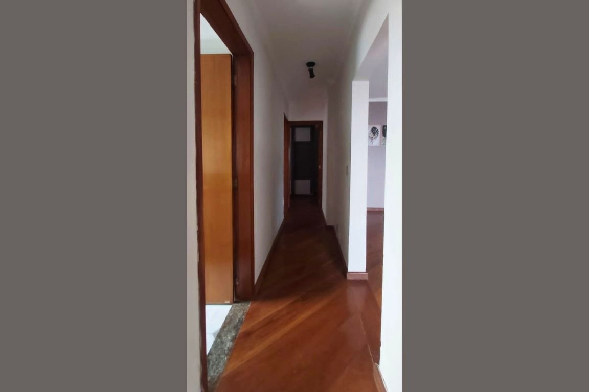 a hallway with a wood floor